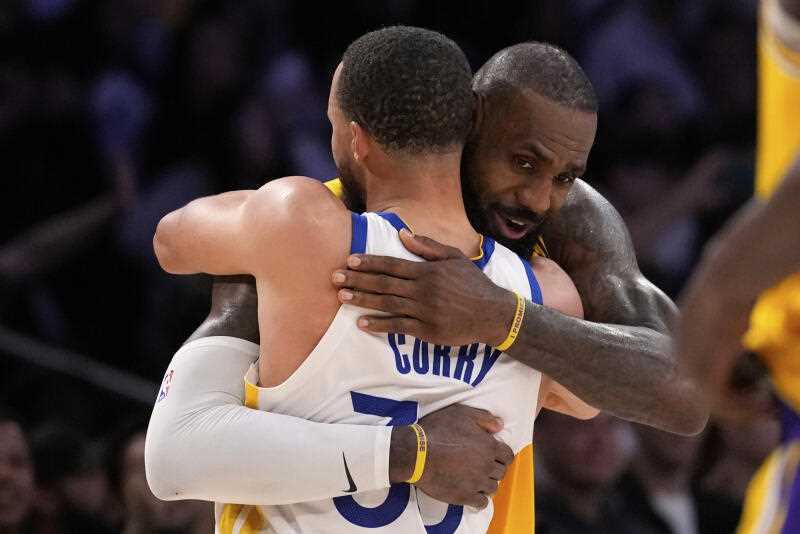 LeBron James and Steph Curry in action